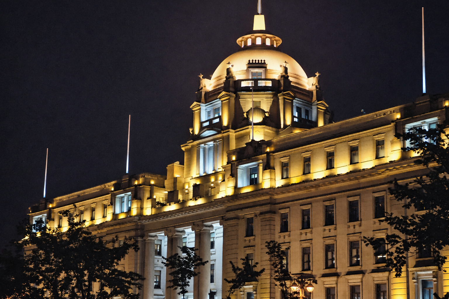 LED floodlight illuminating building facade for outdoor security lighting application