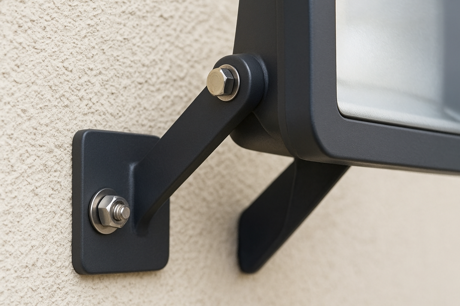 Close-up view of outdoor LED wall washer extension arm and stainless steel mounting bolts securely fixed to the wall surface for precise lighting installation