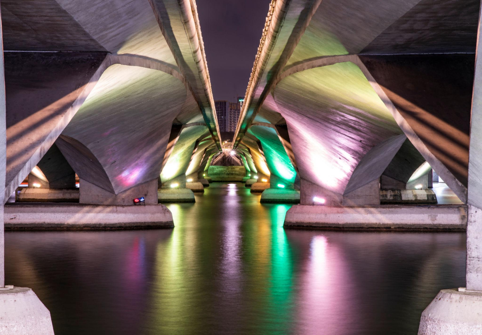 Bridge illuminated with RGB LED flood lights showing gradient colors and uniform architectural lighting effect